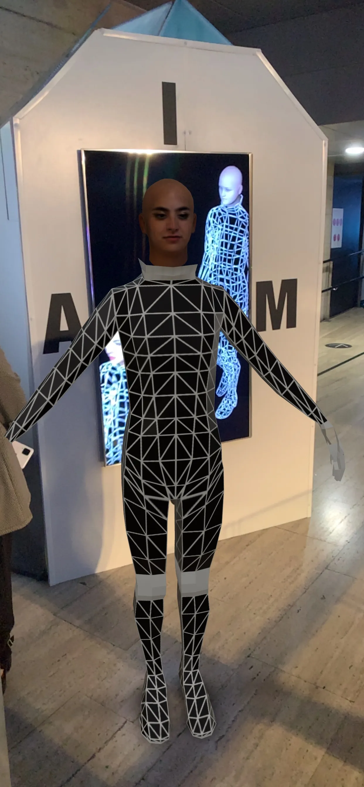 Booth mannequin with AR avatar composited in the installation space