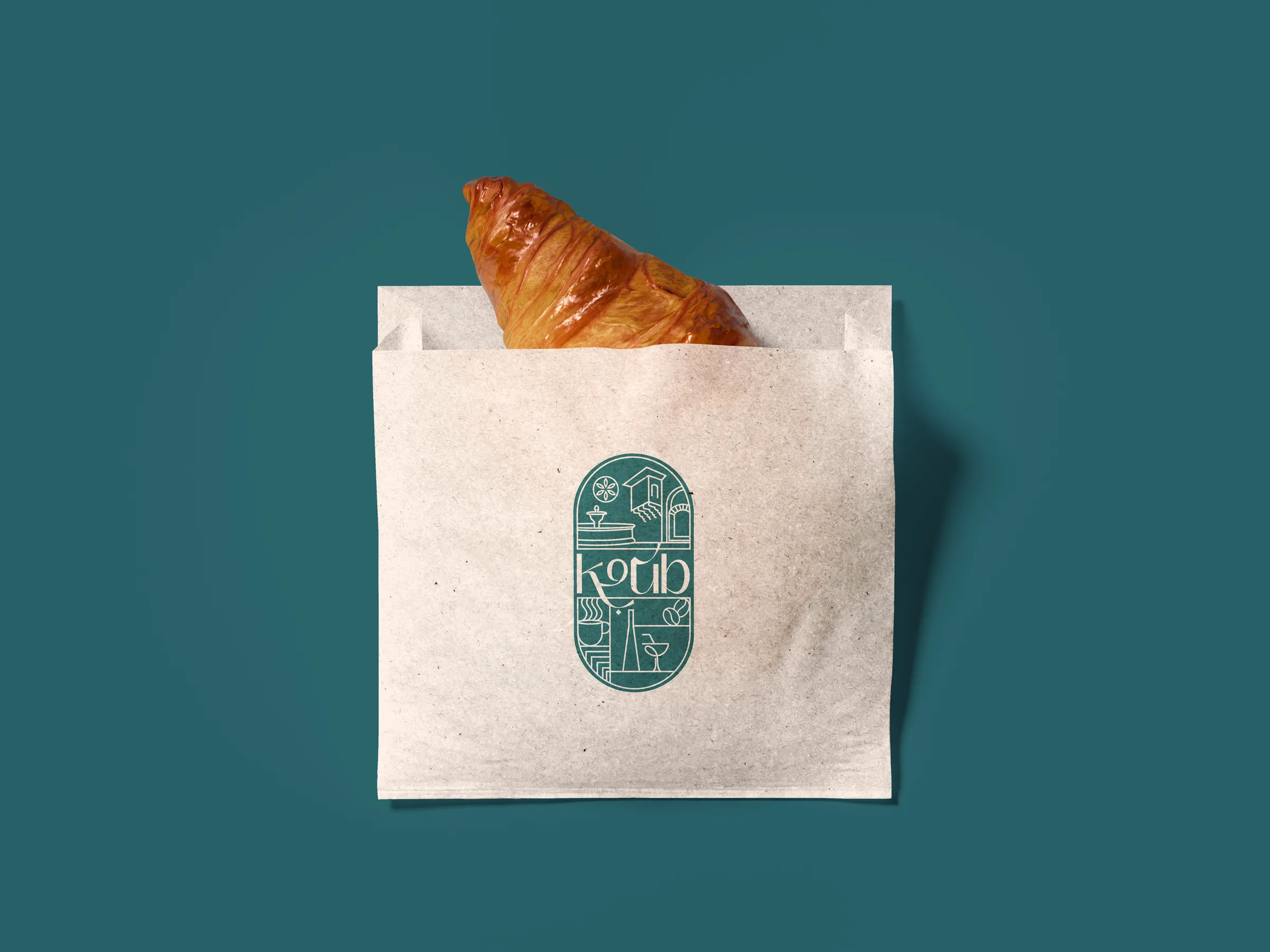 Koub branded paper bag with a croissant